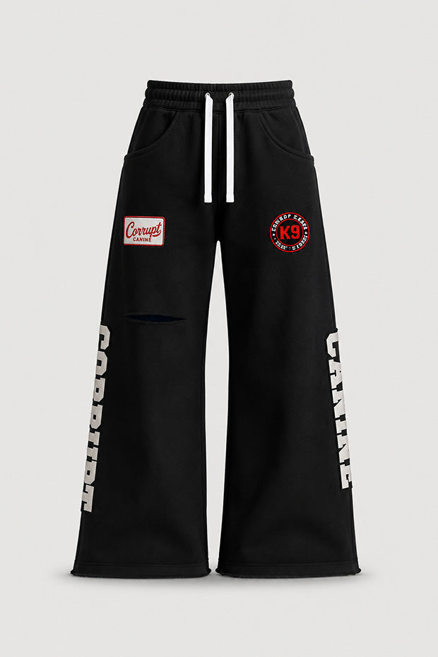 CORRUPTK9 HEAVYWEIGHT WIDE LEG SWEATPANTS WITH EMBROIDERED LOGO PATCHES & STATEMENT LEG GRAPHICS