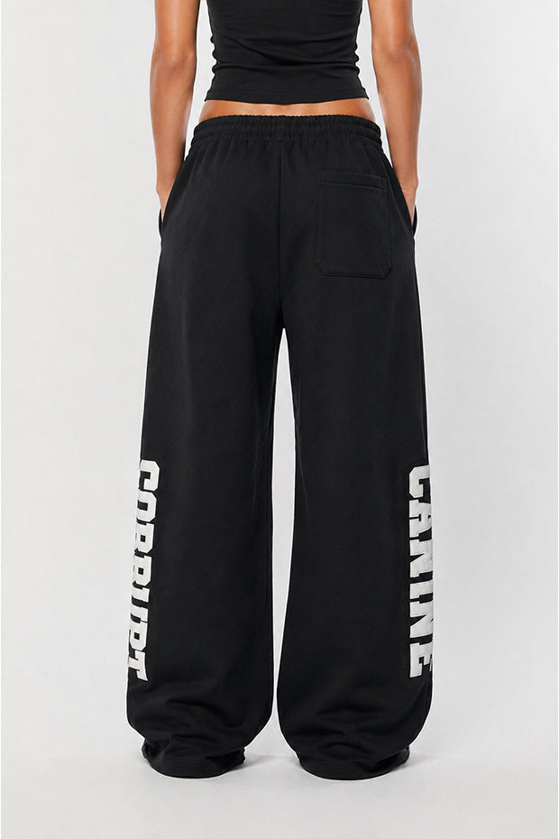CORRUPTK9 HEAVYWEIGHT WIDE LEG SWEATPANTS WITH EMBROIDERED LOGO PATCHES & STATEMENT LEG GRAPHICS